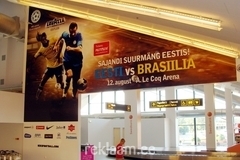 Eesti-Brasiilia jalgpallimatši reklaam Tallinna Lennujaamas