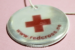 Punane Rist - helkur logoga 